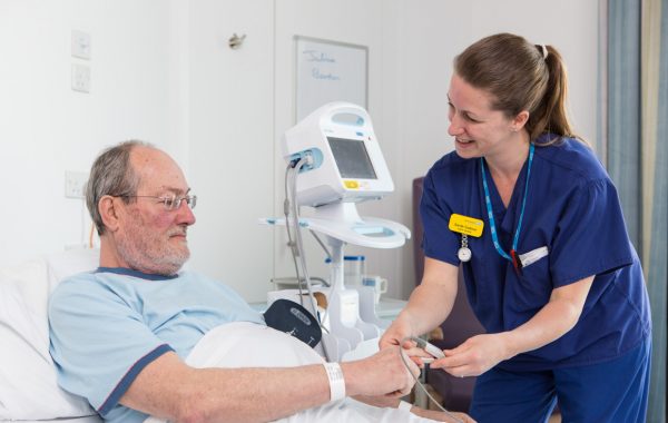 Patient with pulse monitor