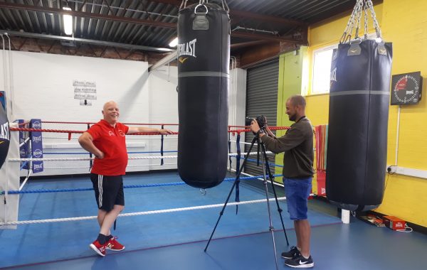 Vince poses for the camera during filming at Empire Fighting Chance
