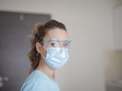 Clinician wearing face mask