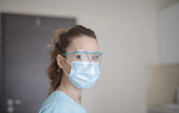 Clinician wearing face mask