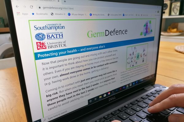 A laptop screen showing the Germ Defence website
