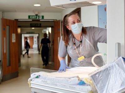 An NHS worker in a face mask