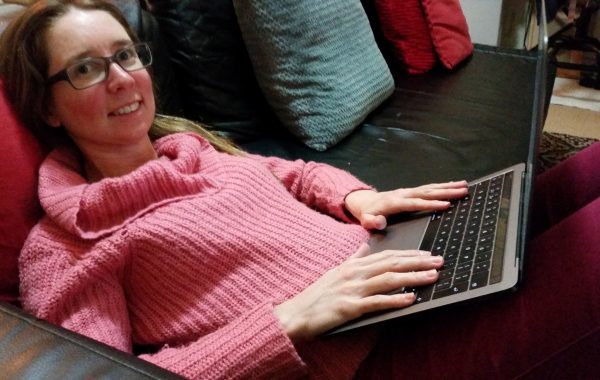 Susan Pywell of our plain language panel, on her laptop