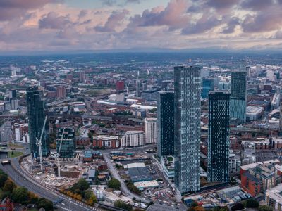 Aerial view of Manchester city in UK on a beautiful sunny day.