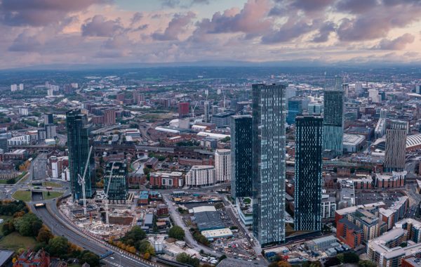 Aerial view of Manchester city in UK on a beautiful sunny day.