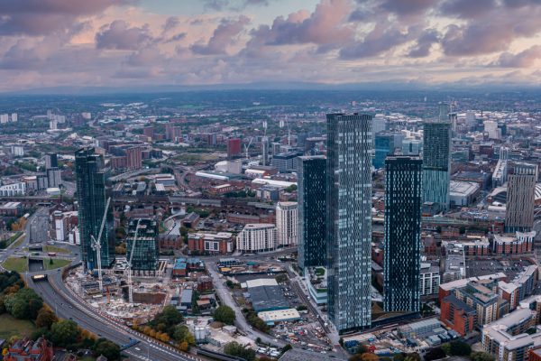 Aerial view of Manchester city in UK on a beautiful sunny day.